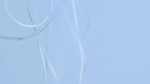 Colorful threads swirling gently Stock Footage 314209107