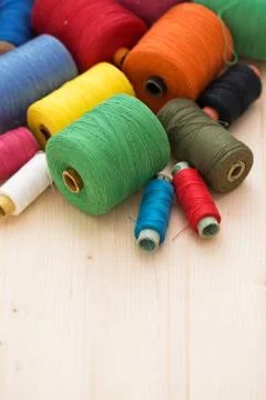 Colorful threads on the table Stock Photos
