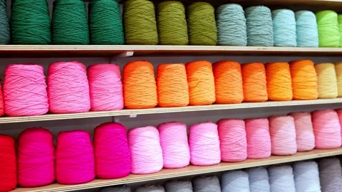 Colorful threads well organized on the shelf Stock Footage 246003727