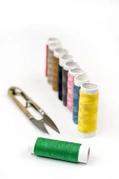 Colorful threads on the white background Stock Photos