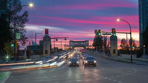 Colorful time lapse of evening traffic at intersection Stock Footage 149702012