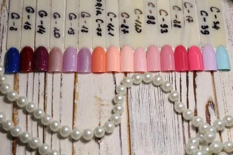 Colorful tips. Set of false nails for manicure. Stock Photos