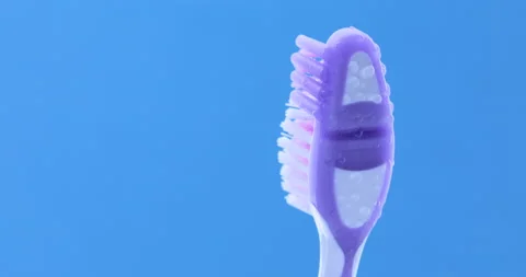 Colorful toothbrushe rotating. Close up Stock Footage 131340938