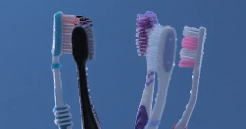 Colorful toothbrushes rotating. Close up 스톡 동영상 131002785
