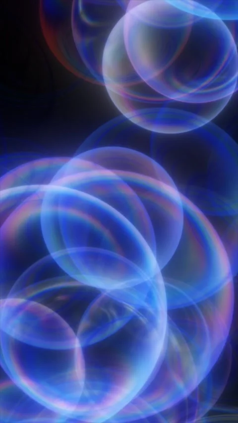 Colorful translucent bubbles wander in a dark environment Stock Footage 312387576