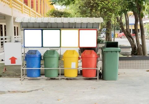 Colorful trash cans for sorting garbage with 4 blank frames. For plastic, g.. Stock Photos
