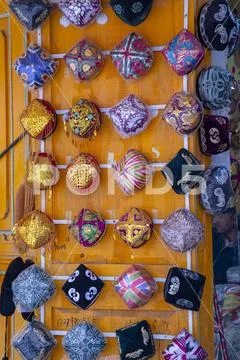 Colorful Uigher hats on display Stock Photos