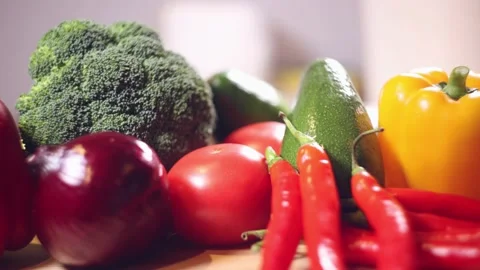 Colorful vegtables close up on a kitchen table. Video stock 144023786