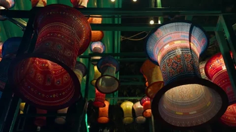 Colorful vietnamese lanterns with intricate patterns glowing softly at night, Stock Footage 344911926