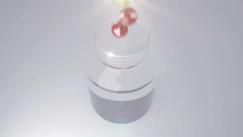Colorful vitamins fall into the small bottle Stock Footage 108567888