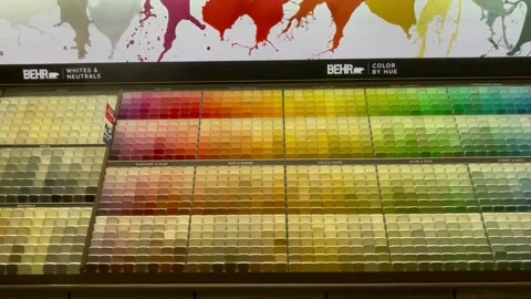 Colorful wall of paint samples on display. Video stock 202310604