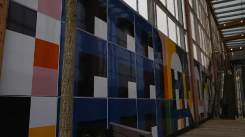 A colorful wall with a tree in the middle Stock Footage 297858481