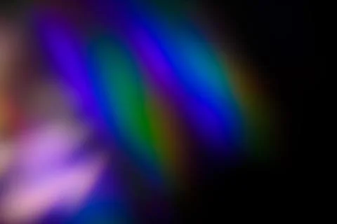 Colorful warm rainbow light leaks on black background with dust texture Stock Illustration