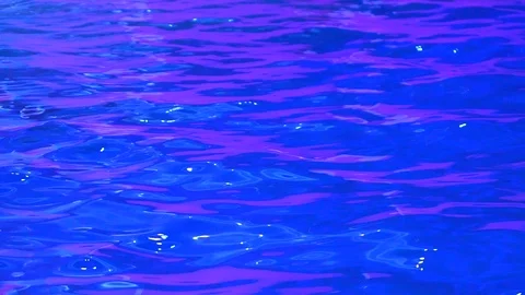 Colorful water surface. Abstract reflection of neon signs in a water at night Stock Footage 101315970