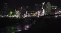 Colorful Waterfront Buildings And Crowds Of People At Night Gwangalli Beach HD HD Footage