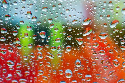 Colorful wet window Stock Photos