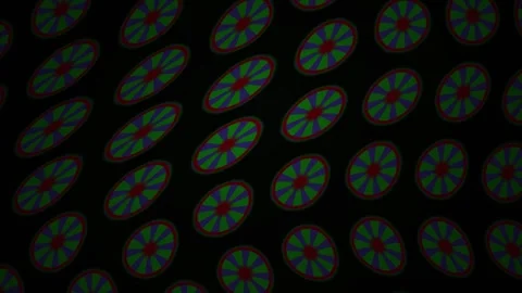 Colorful Wheel Motif Pattern Shifting Across Dark Background in Motion Stock Footage 344719699