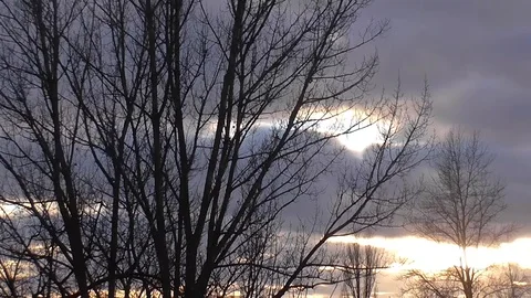 Colorful Winter Sunset and Moving Clouds Stock Footage 102408010