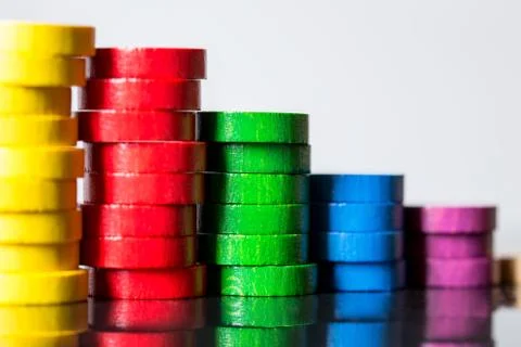 Colorful wooden stacks with reflections Stock Photos