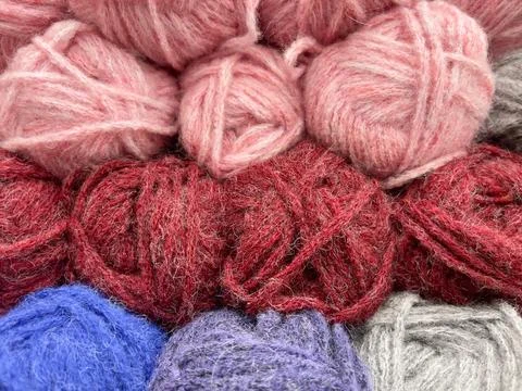 Colorful woolen threads for knitting as background texture close-up Stock Photos