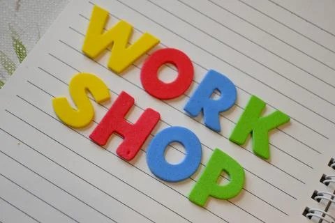 Colorful workshop lettering on a lined notebook Stock Photos