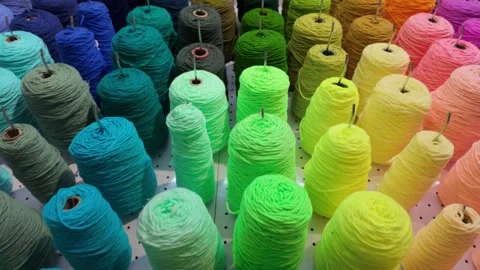 Colorful yarn wall in a creative tufting studio Stock Footage 342272403