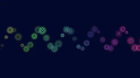 Colorful zigzag of circles on a dark background Stockbeeldmateriaal 297602353