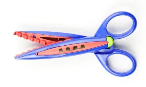Colorful zigzag scissors on white background Stock Photos