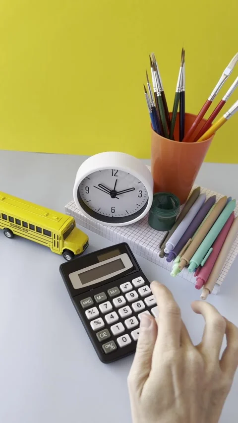 Colorfull Desk Setup with Globe and Calculator Workspace with Calculator an.. Stock Footage 309397113