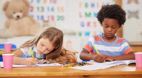 Coloring and drawing both help kids improve fine motor skills. preschool Stock Photos
