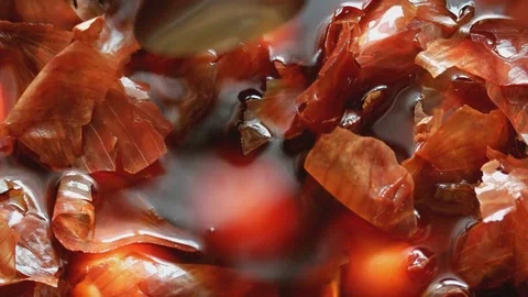 Coloring and mixing Easter eggs in onion husks. Stock Footage 74197710