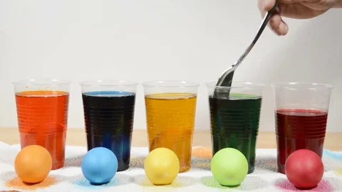 Coloring easter eggs fast motion Stock Footage 72709215