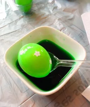 Coloring Easter eggs Stock Photos