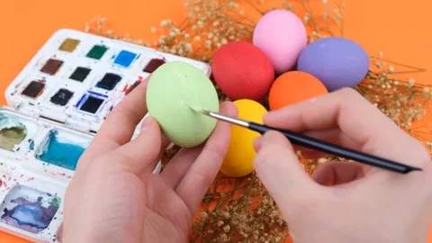 Coloring eggs easter Stock Footage 238935392