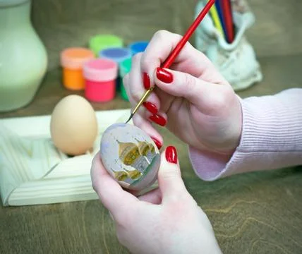 Coloring eggs for Easter Stock Photos