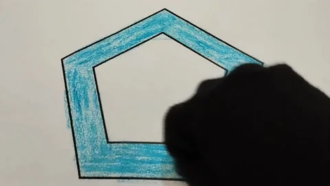 Coloring a five-triangle shape with a light blue crayon Stock Footage 224996127