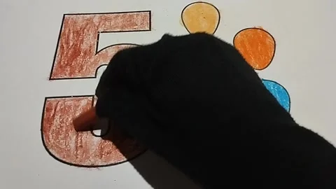 Coloring the number five using a brown crayon Stock Footage 224972420