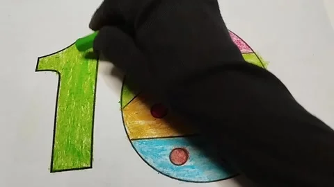 Coloring number one with a light green crayon Stock Footage 224993982
