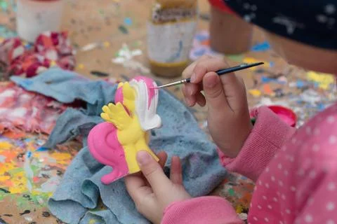 Coloring of plaster figures Stock Photos