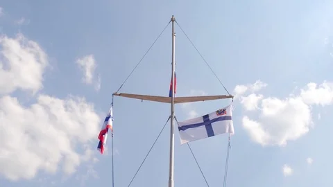 Coloring of ships with flags. Nautical Flags on fluttering in the wind on blue Stock Footage 79901719