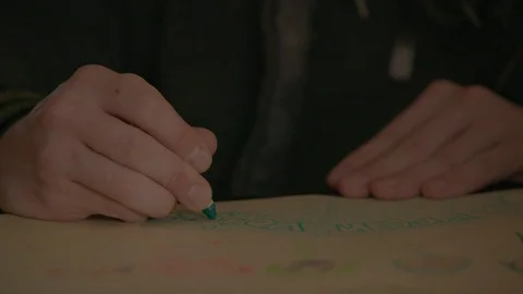 Coloring using a green crayon Stock Footage 103863059