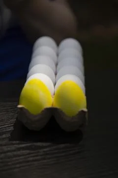 Coloring Yellow Easter Eggs Stock Photos