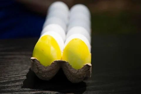 Coloring Yellow Easter Eggs Stock Photos