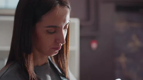 Colorist prepares dye mixture meticulously, professional hairstylist attentively Stock Footage 321651068