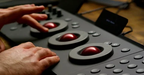 Colorist Using Color Grading Control Surface 2 Stock Footage 75078362