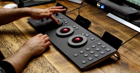 Colorist Using Color Grading Control Surface 1 Stock Footage 75078428