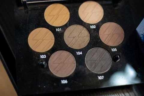 Coloristic solution. Palette of basic beige-brown shades for eye makeup, facial Stock Photos
