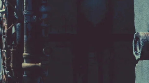 Colors and Shadows Dance on Rusted Pipes in an Industrial Setting Video stock 344546454