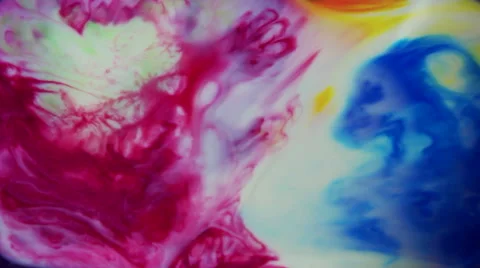 Colors blending fluid paint and milk Stock Footage 57229312