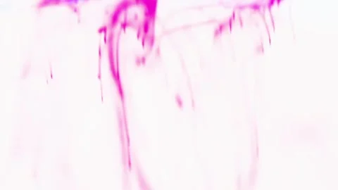 Colors particles falling in water. Potassium permanganate crystals in the water. 스톡 동영상 150558955